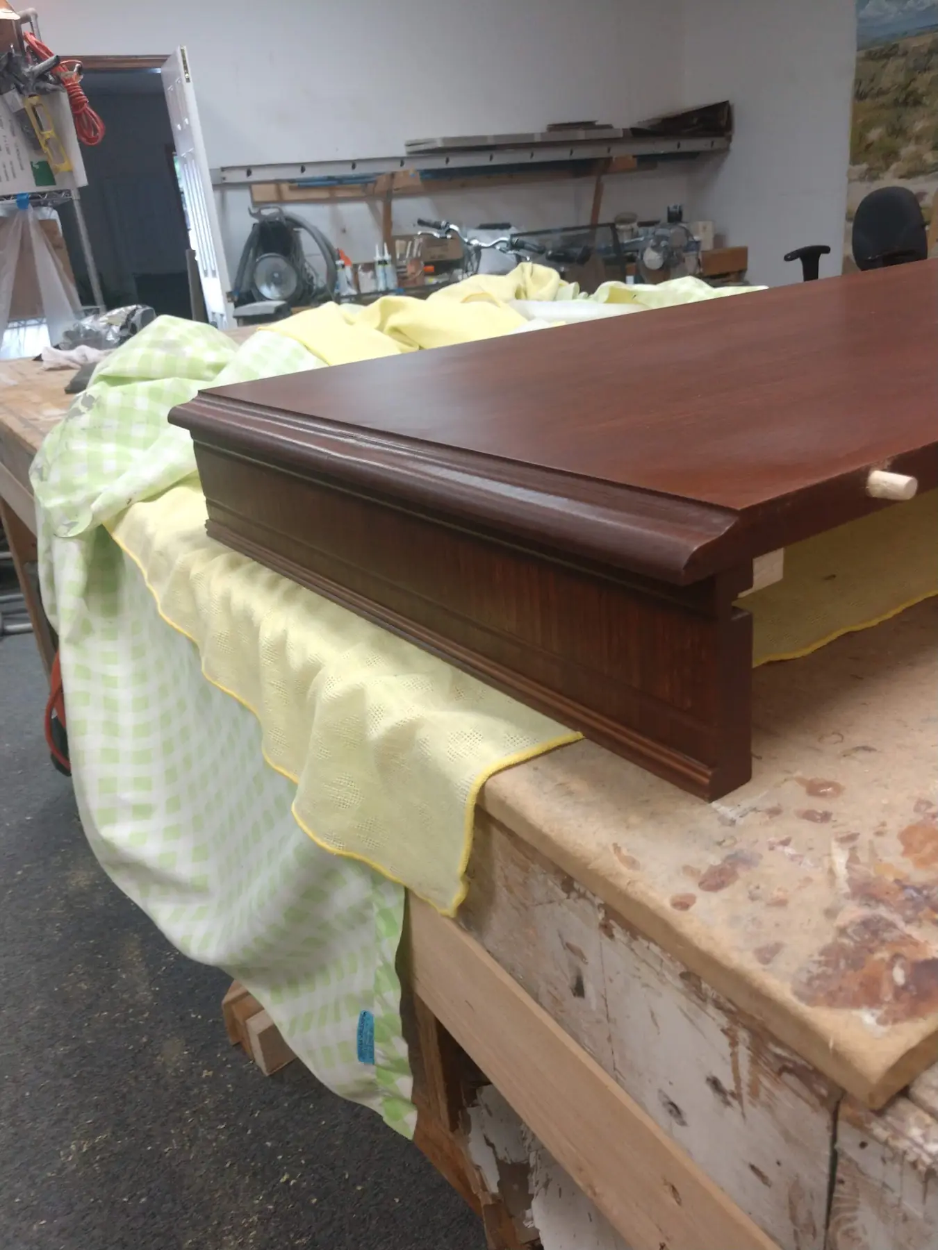 A wood top being finished on the shop bench