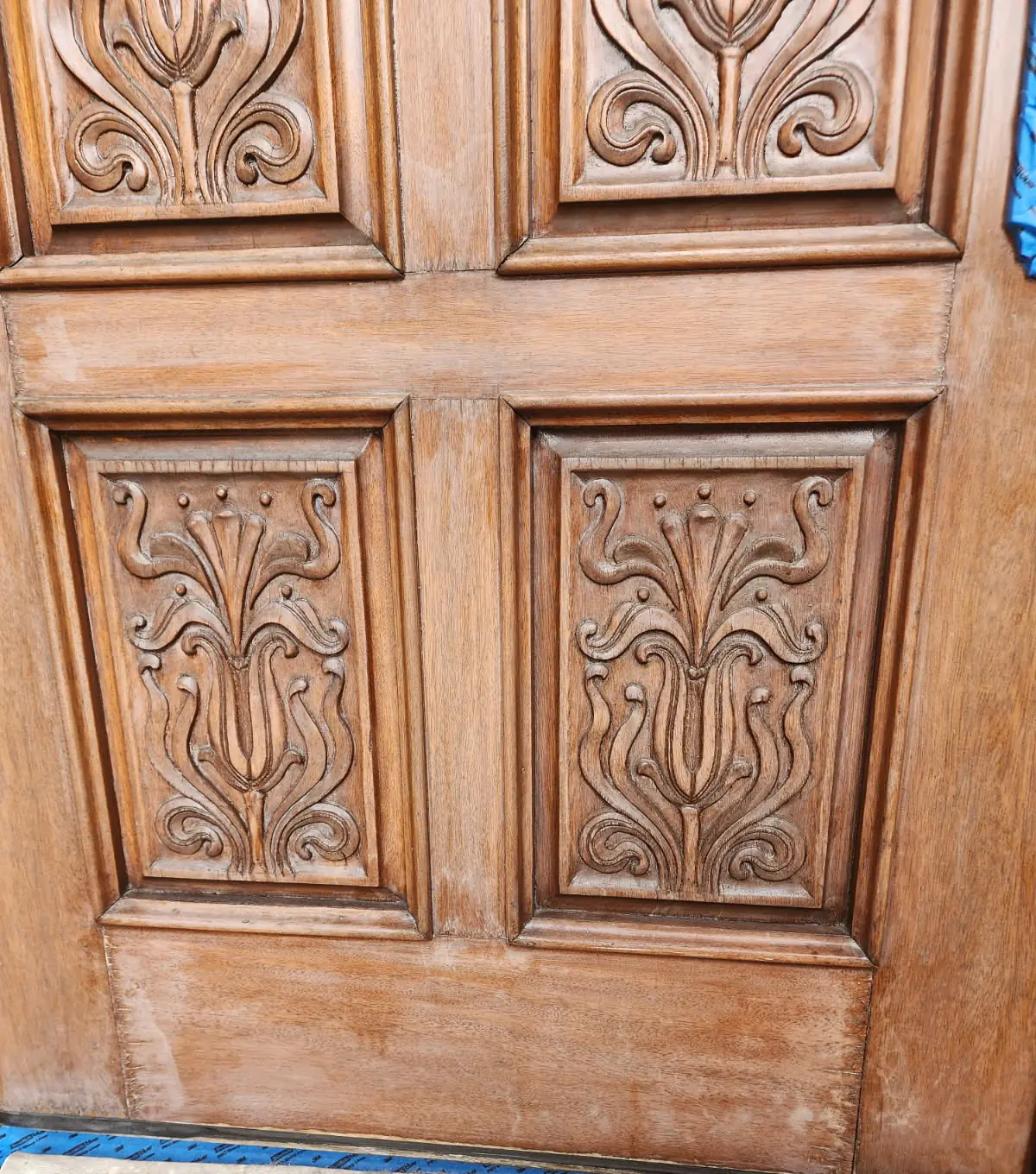 The same panels stripped down to bare wood