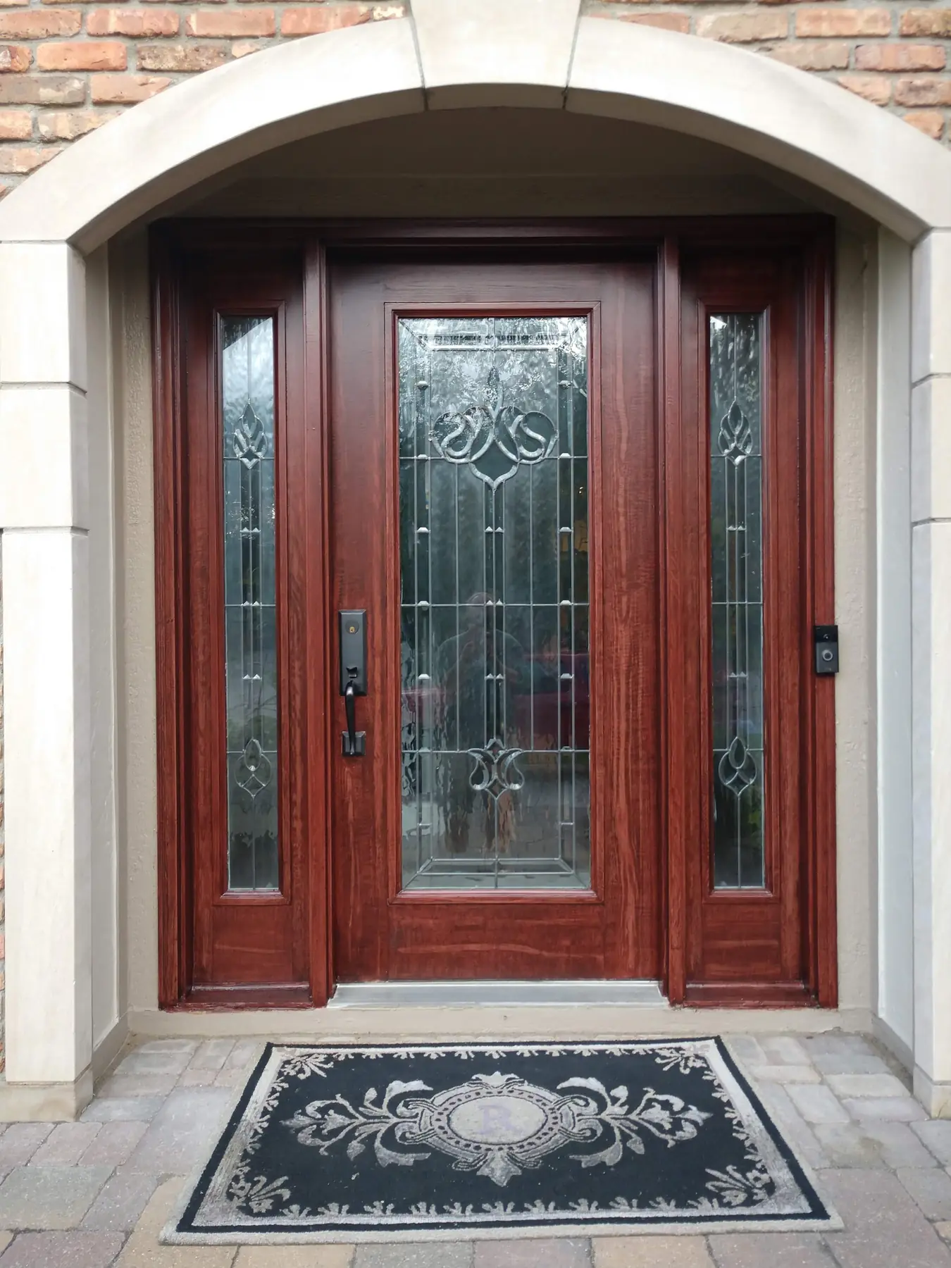 Leaded-glass entry, with sidelights