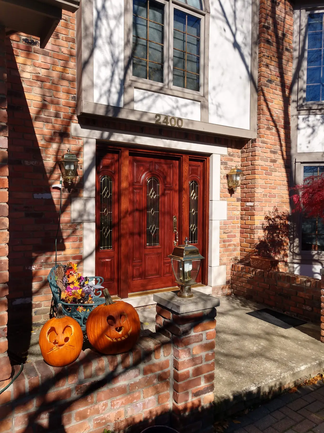 Restored double front doors with leaded glass